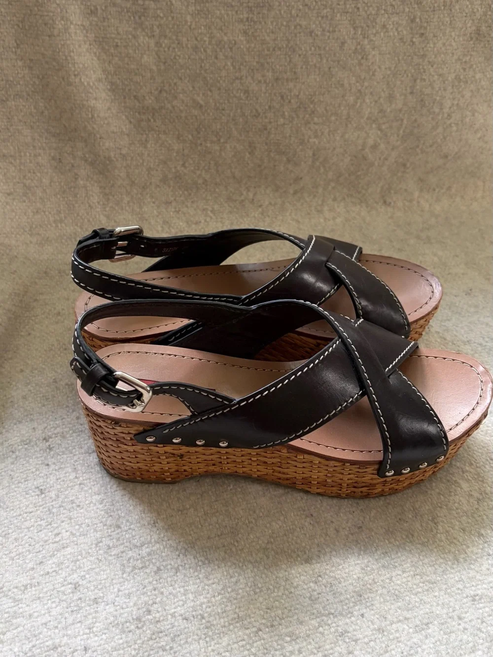 Prada Black Leather Wedge Sandals with Woven Platform and Silver Studs